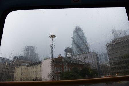 London, UK - August 22, 2010: Outside view of 30 St Mary Axe, likely being called Gherkin, 30 St Mary Axe was completed in December 2003 and now this is one of the most iconic modern buildings in London. のeditorial素材