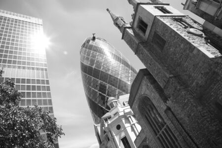 London, UK - May 25, 2011: Outsid view of 30 St Mary Axe, likely being called Gherkin, 30 St Mary Axe was completed in December 2003 and now this is one of the most iconic modern buildings in London. のeditorial素材