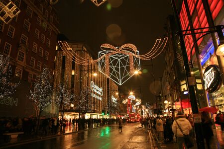 London, UK - November 21, 2010: Street Night View of Oxford Street with Christmas Decoration. Oxford Street is one of the most famous shopping street in London and also famous for it's beautiful Christmas Decoration.  のeditorial素材