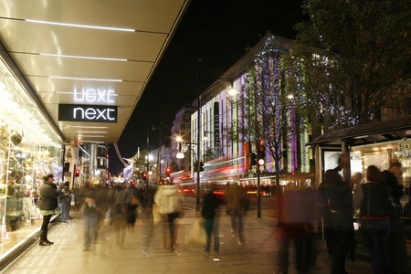 London, UK - November 18, 2011: Christmas Lights Display on Oxford Street in London. The modern colourful Christmas lights attract and encourage people to the street. のeditorial素材