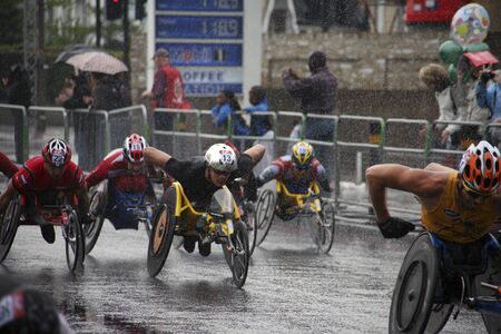 London, UK - April 25, 2010: Wheelchair racing contestants in the London Marathon. The London Marathon is next to New York, Berlin, Chicago and Boston to the World Marathon Majors, the Champions League in the marathon. 

のeditorial素材