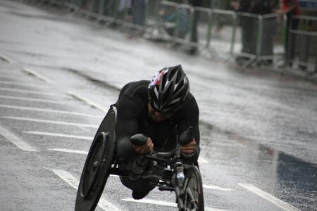 London, UK - April 25, 2010: Wheelchair racing contestants in the London Marathon. The London Marathon is next to New York, Berlin, Chicago and Boston to the World Marathon Majors, the Champions League in the marathon. 

のeditorial素材
