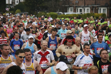 London, UK - April 25, 2010: Runners in the London Marathon. The London Marathon is next to New York, Berlin, Chicago and Boston to the World Marathon Majors, the Champions League in the marathon. 
のeditorial素材