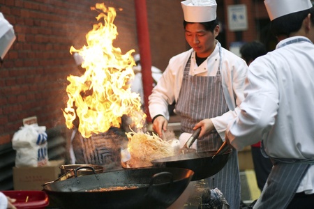 London, UK - February 18, 2007: Chinese chefs work at the Chinese New Year celebrations in London's Chinatown. のeditorial素材