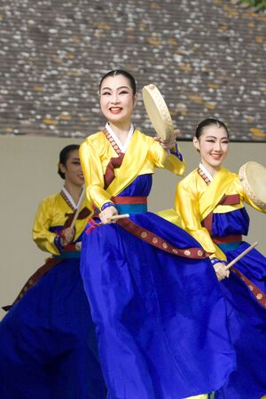 London, UK - August 15, 2009: Korean ethnic dancers perform, Hand Drum Dance, drum dance, in the Korean Festival on August 15, 2009 in London, UK. のeditorial素材
