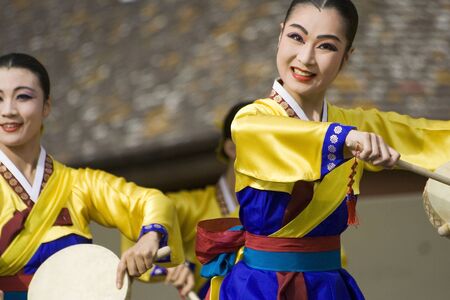 London, UK - August 15, 2009: Korean ethnic dancers perform, Hand Drum Dance, drum dance, in the Korean Festival on August 15, 2009 in London, UK. のeditorial素材