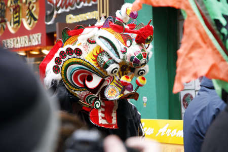 LONDON - January 29, 2012: Performers, lion dance, take part in the celebration of Chinese New Year. Various traditional performance attract thousands of people to the street. 
のeditorial素材