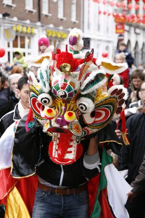 LONDON - January 29, 2012: Performers, lion dance, take part in the celebration of Chinese New Year. Various traditional performance attract thousands of people to the street. 
のeditorial素材