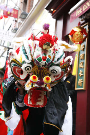 LONDON - January 29, 2012: Performers, lion dance, take part in the celebration of Chinese New Year. Various traditional performance attract thousands of people to the street. 
のeditorial素材