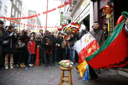 LONDON - January 29, 2012: Performers, lion dance, take part in the celebration of Chinese New Year. Various traditional performance attract thousands of people to the street. 
のeditorial素材