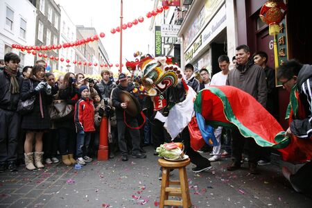 LONDON - January 29, 2012: Performers, lion dance, take part in the celebration of Chinese New Year. Various traditional performance attract thousands of people to the street. 
のeditorial素材