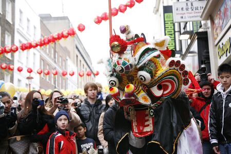 LONDON - January 29, 2012: Performers, lion dance, take part in the celebration of Chinese New Year. Various traditional performance attract thousands of people to the street. 
のeditorial素材