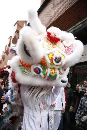 LONDON - January 29, 2012: Performers, lion dance, take part in the celebration of Chinese New Year. Various traditional performance attract thousands of people to the street. 
のeditorial素材