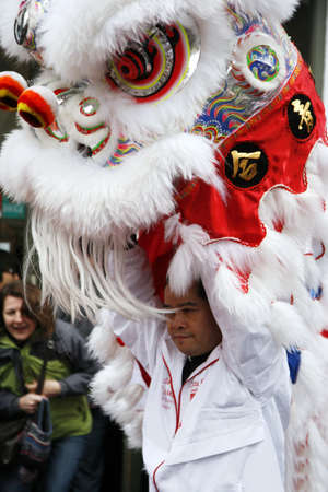 LONDON - January 29, 2012: Performers, lion dance, take part in the celebration of Chinese New Year. Various traditional performance attract thousands of people to the street. 
のeditorial素材