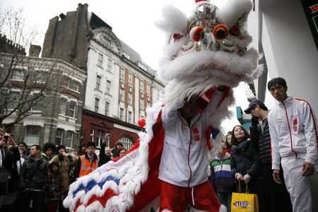 LONDON - January 29, 2012: Performers, lion dance, take part in the celebration of Chinese New Year. Various traditional performance attract thousands of people to the street. 
のeditorial素材