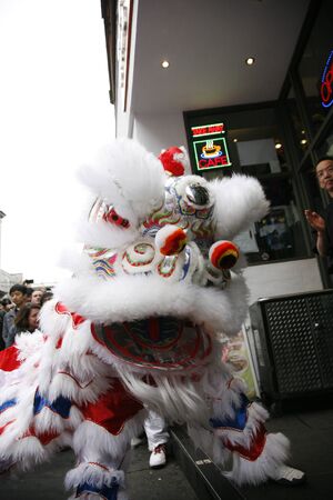 LONDON - January 29, 2012: Performers, lion dance, take part in the celebration of Chinese New Year. Various traditional performance attract thousands of people to the street. のeditorial素材