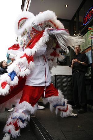 LONDON - January 29, 2012: Performers, lion dance, take part in the celebration of Chinese New Year. Various traditional performance attract thousands of people to the street. のeditorial素材