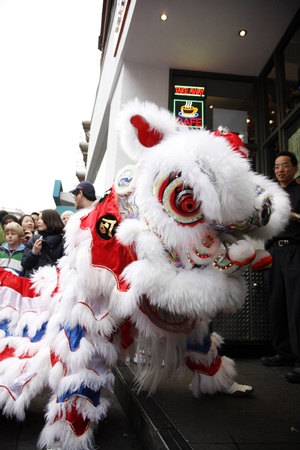 LONDON - January 29, 2012: Performers, lion dance, take part in the celebration of Chinese New Year. Various traditional performance attract thousands of people to the street. のeditorial素材