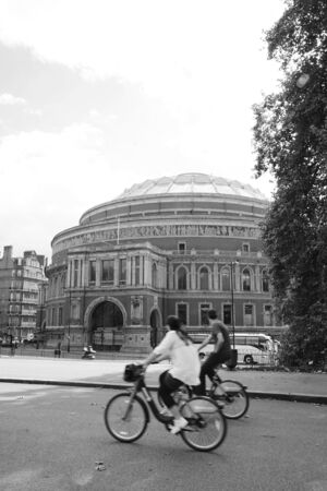London, UK - September 17, 2010 : Commuter's on rental bike. London's bicycle sharing scheme, to help ease traffic congestion, sponsored by Barclays, was launched on 30 July 2010. Currently there are some 6,000 bikes and 400 docking stations in London.のeditorial素材