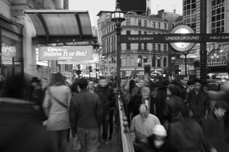 London, UK - November 13, 2010: Tourists in Piccadilly Circus, famous tourist attraction, road junction, built in 1819, meeting place, tourist attraction, in West End, inks to Shaftesbury Avenue, Regent Street, Haymarket, Leicester Square and Glasshouse Sのeditorial素材