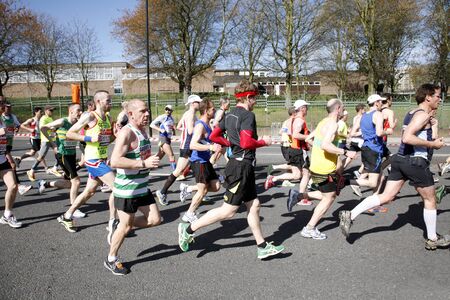 London, UK - April 22, 2012: Runners in London Marathon. The London Marathon is next to New York, Berlin, Chicago and Boston to the World Marathon Majors, the Champions League in the marathon.のeditorial素材