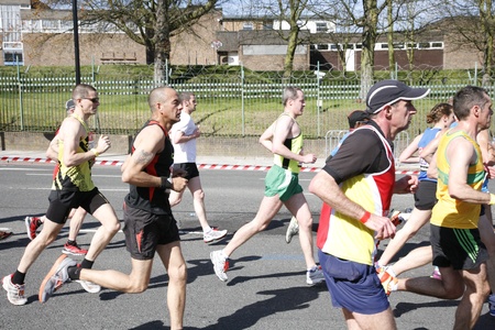 London, UK - April 22, 2012: Runners in London Marathon. The London Marathon is next to New York, Berlin, Chicago and Boston to the World Marathon Majors, the Champions League in the marathon.のeditorial素材