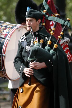 London, UK - June 16, 2012: Queen's Bands at Queen's Birthday Parade. Queen's Birthday Parade take place to Celebrate Queen's Official Birthday in every June in London. 

のeditorial素材