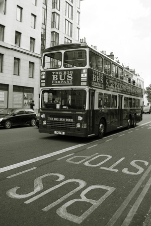 London, UK - June 6, 2010: London Sightseeing bus. Tourists love the open-top tour bus enable them, a great way to travel around the capital, see the major sights. London attracts 30 million international visitors per year. 
のeditorial素材