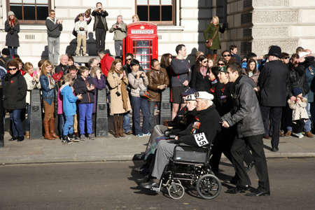 London, UK - November 11, 2012: People take part in Remembrance Day, Poppy Day or Armistice Day, 11 every Nov, observed by Commonwealth of Nations, to remember armed forces who have died since First World War. 
のeditorial素材