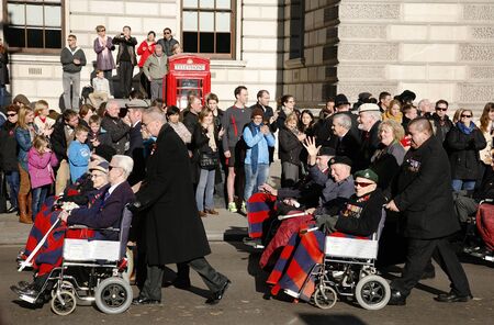 London, UK - November 11, 2012: People take part in Remembrance Day, Poppy Day or Armistice Day, 11 every Nov, observed by Commonwealth of Nations, to remember armed forces who have died since First World War. 
のeditorial素材
