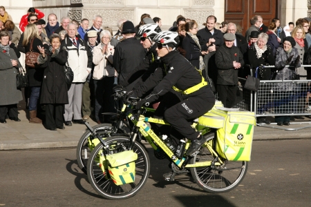 London, UK - November 11, 2012: St John Ambulance aiders, bicycles allow to move more quickly through crowds with medical equipment, are ready to help patients at Remembrance Day.
のeditorial素材