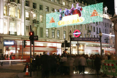 London, UK - November 17, 2011: Christmas Lights Display on Regend Street in London. The modern colourful Christmas lights attract and encourage people to the street.のeditorial素材