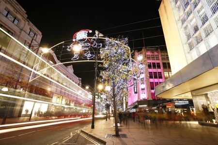 London, UK - November 23, 2012: Christmas Lights Display on Oxford Street in London. The modern colourful Christmas lights attract and encourage people to the street.
のeditorial素材