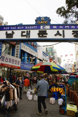 Seoul, South Korea - April 21, 2011: Gate No 6 of Nam Dae Mun Market, crowd present. This is the oldest, dates back to 1414, and largest traditional market in South Korea. 
のeditorial素材