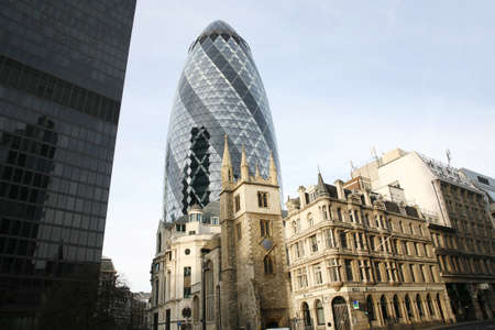 London , UK - March 25, 2012: Outside view of 30 St Mary Axe, also called Gherkin, a skyscraper in the City of London, 180 metres height, 41 floors, completed in 2003, seen from pedestrian walk path. 
のeditorial素材