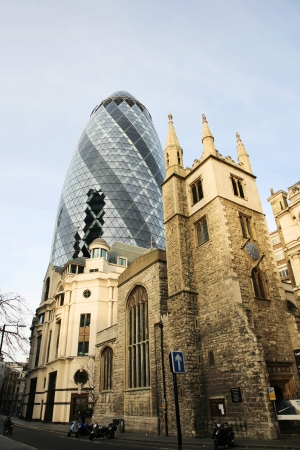 London , UK - March 25, 2012: Outside view of 30 St Mary Axe, also called Gherkin, a skyscraper in the City of London, 180 metres height, 41 floors, completed in 2003, seen from pedestrian walk path. 
のeditorial素材
