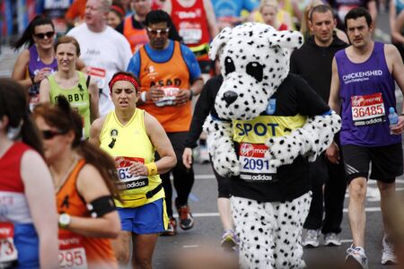 London, UK - April 21, 2013: Participant in the London Marathon wearing funny costume. The London Marathon is next to New York, Berlin, Chicago and Boston to the World Marathon Majors, the Champions League in the marathon.
のeditorial素材
