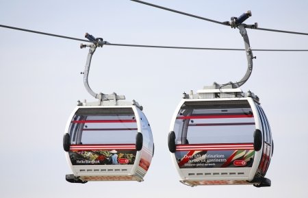 London , UK - May 26, 2013:  Gondolas of the Emirates Air Line cable car, opened June 2012, run by TFL, links the Greenwich Peninsula with Royal Dock, 1km, across the River Thames. 
のeditorial素材