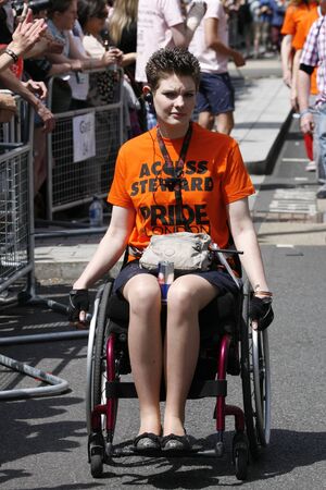 London, UK - June 29, 2013: People, on wheelchair, take part in London's Gay Pride, also called London Pride, estimated 25,000 people took part in the march, Parade to support gay rights.
のeditorial素材