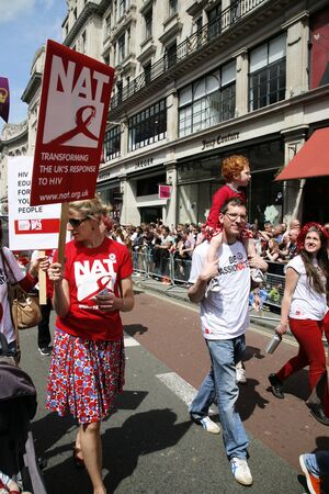 London, UK - June 29, 2013: People, family group with children,  take part in London's Gay Pride, also called London Pride, estimated 25,000 people took part in the march, Parade to support gay rights.
のeditorial素材