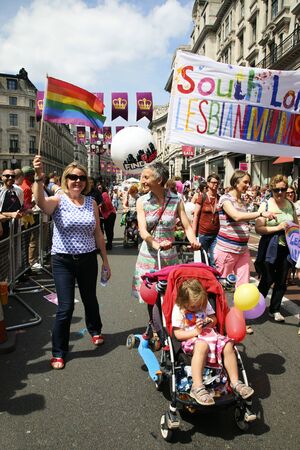 London, UK - June 29, 2013: People, family group with children,  take part in London's Gay Pride, also called London Pride, estimated 25,000 people took part in the march, Parade to support gay rights.
のeditorial素材