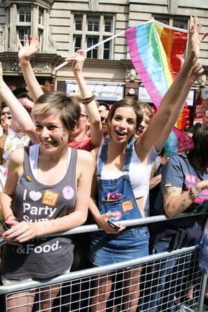London, UK - June 29, 2013: Supporters watch and cheer London's Gay Pride participants, estimated 25,000 people took part in the march, Parade to support gay rights.
のeditorial素材