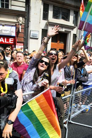 London, UK - June 29, 2013: Supporters watch and cheer London's Gay Pride participants, estimated 25,000 people took part in the march, Parade to support gay rights.
のeditorial素材