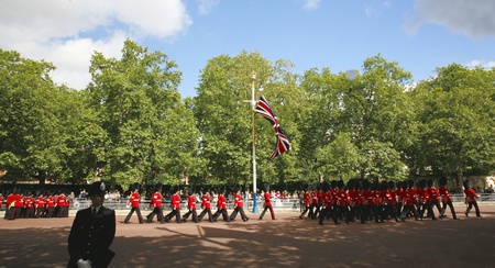 London, UK - June 15, 2013: The parade, soldiers present,  marching at Queen's Birthday Parade. Queen's Birthday Parade take place to Celebrate Queen's Official Birthday in every June in London. 
のeditorial素材