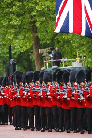 London, UK - June 15, 2013: Queen's Soldier at Queen's Birthday Parade, union jack present. Queen's Birthday Parade take place to Celebrate Queen's Official Birthday in every June in London. 
のeditorial素材