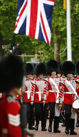 London, UK - June 15, 2013: Queen's Bands at Queen's Birthday Parade, Union Jack flag in the background. Queen's Birthday Parade take place to Celebrate Queen's Official Birthday in every June in London. 
のeditorial素材