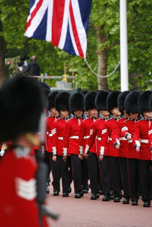 London, UK - June 15, 2013: Queen's Soldier at Queen's Birthday Parade, union jack present. Queen's Birthday Parade take place to Celebrate Queen's Official Birthday in every June in London. 
のeditorial素材