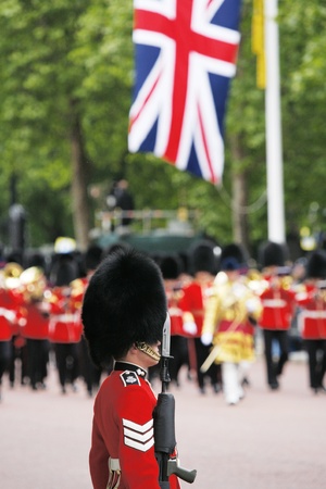 London, UK - June 15, 2013: Queen's Soldier at Queen's Birthday Parade, union jack present. Queen's Birthday Parade take place to Celebrate Queen's Official Birthday in every June in London. 
のeditorial素材