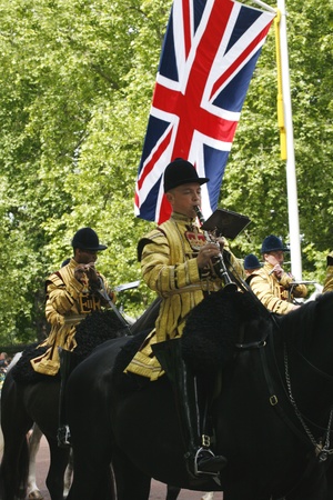 London, UK - June 15, 2013: Queen's Bands, mounted band, union jack flag in the back ground, at Queen's Birthday Parade. Queen's Birthday Parade take place to Celebrate Queen's Official Birthday in every June in London. 
のeditorial素材