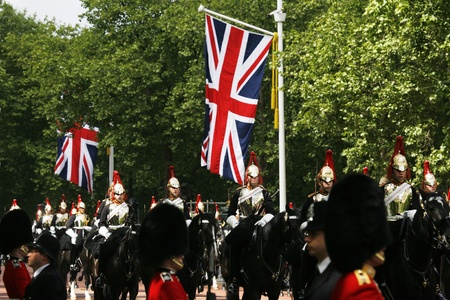 London, UK - June 15, 2013: Household Cavalry at Queen's Birthday Parade, Union Jack in the background. Queen's Birthday Parade take place to Celebrate Queen's Official Birthday in every June in London. 
のeditorial素材